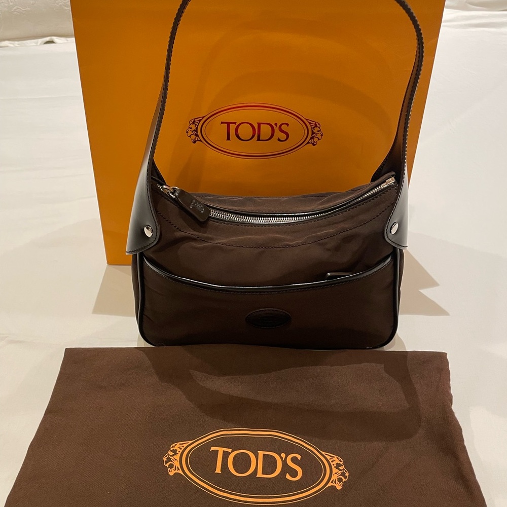 Tod’s small brown nylon hobo  .